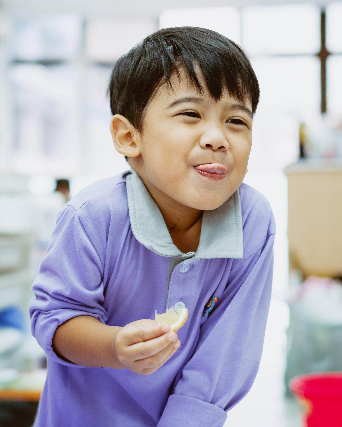 A child laughing at Kidya Childcare